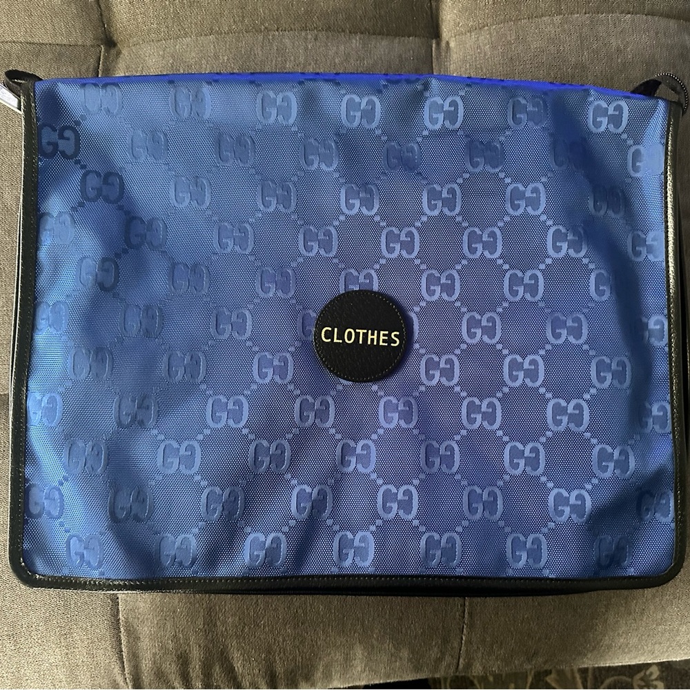 COPY - Large Gucci packing cube.Off the grid line.approx 14” x 18”. Never used,…